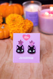Aretes de gato negro