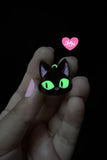 Aretes de gato negro