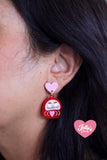 Aretes Daruma para la perseverancia