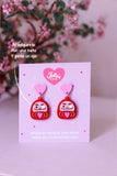 Aretes Daruma para la perseverancia