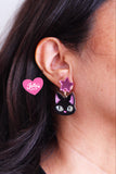 Aretes de gato negro