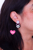 Aretes gatito calavera brilla en la oscuridad