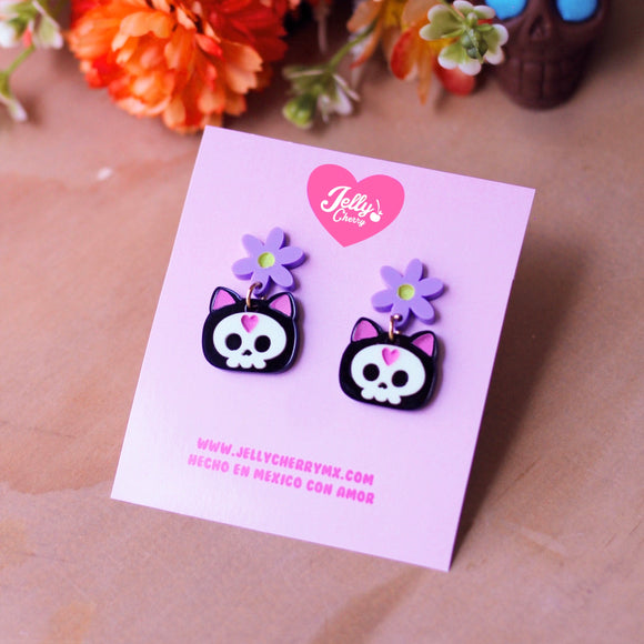 Aretes gatito calavera brilla en la oscuridad