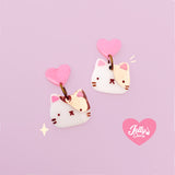 Aretes gatos con crema