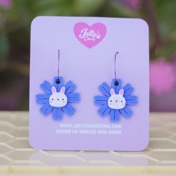 Aretes conejos y cazadores