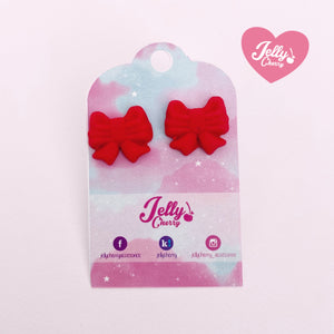 Aretes de moñito rojo