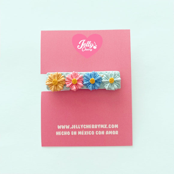 Broche flores azules